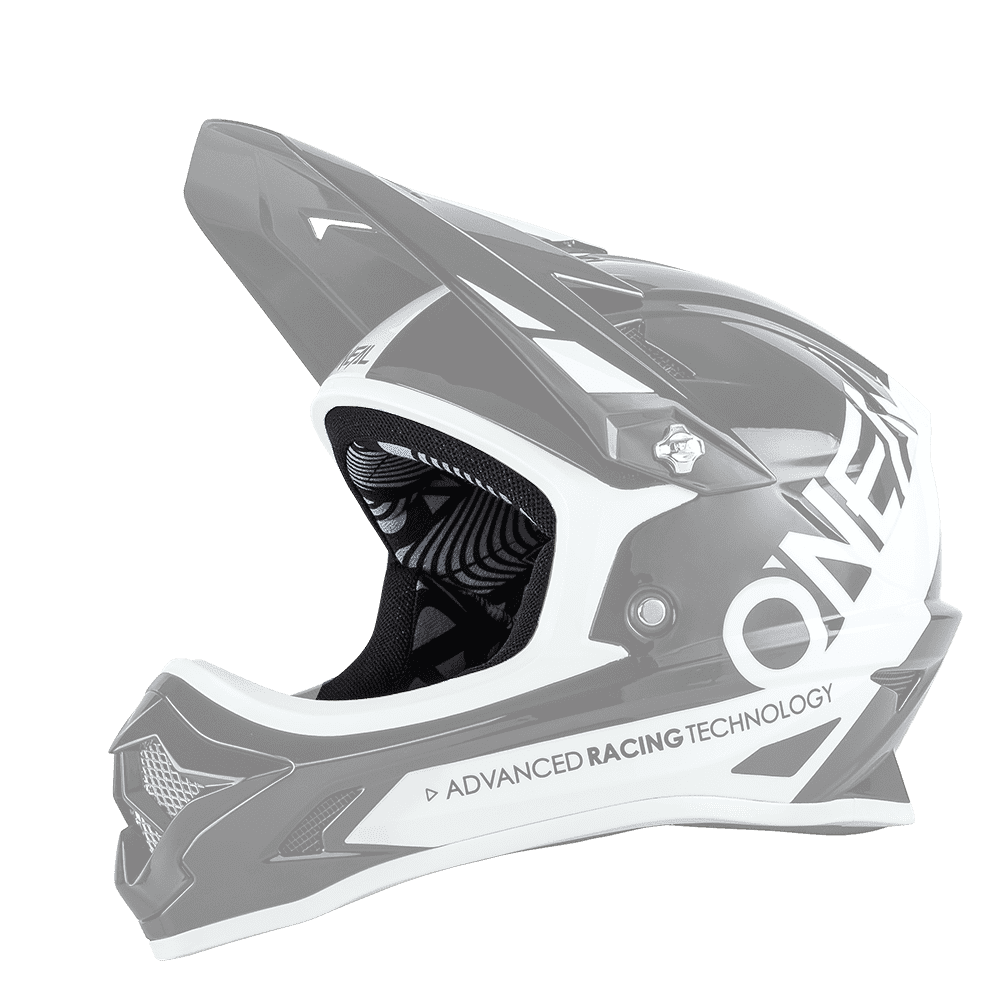 El casco O'NEAL Liner & Cheek Pads Backflip es un casco integral de motocross blanco y negro con visera, aberturas de ventilación y las palabras "O'NEAL" y "ADVANCED RACING TECHNOLOGY" impresas en el lateral.