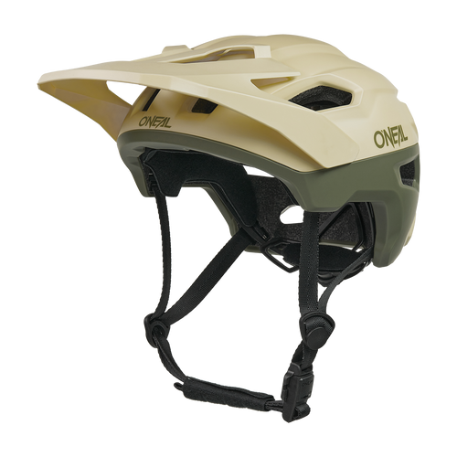 The O'NEAL TRAILFINDER EVO helmet SOLID is a beige and olive green mountain bike helmet with a visor, multiple ventilation openings, adjustable black chin strap and is compatible with the optional Quin Smart Safety Sensor.