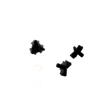 Three small, black, cross-shaped screws of the O'NEAL Screw Set 2SRS Youth Helmet are displayed on a white background at different angles to show multiple sides.