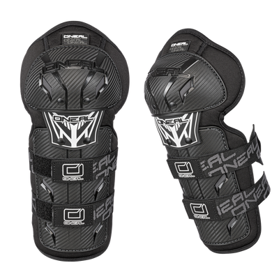 A pair of O'NEAL PRO III Knee Guard CARBON in black with adjustable straps and a stylish carbon look pattern on a black background.