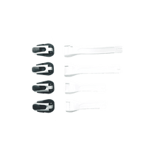 Das O'NEAL RMX Boot - Full Buckle/Strap Kit von O'NEAL ist auf einem weißen Hintergrund abgebildet und zeigt sechs weiße Schnallen und vier schwarze Verschlussriemen, die ordentlich angeordnet und von oben betrachtet werden.