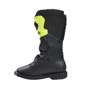 Der O'NEAL RIDER PRO Stiefel Kinder ist ein schwarzer Offroad-Stiefel mit hohem Schaft, Metallkappe und gelbem Schienbeinschutz, der für junge Fahrer entwickelt wurde, die einen dauerhaften Schutz suchen.
