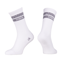 Two white O'NEAL MTB performance socks SOLID with gray stripes and small white dots on the upper edge. "O'NEAL" is printed in white on the stripe. Displayed on invisible foot shapes against a white background.
