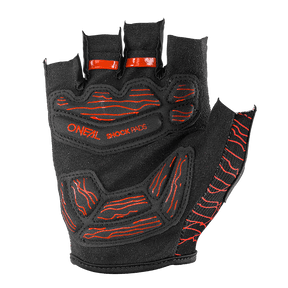 The O'NEAL DROP fingerless glove is a black cycling glove with red stripes and shock-absorbing padding. The brand name "O'NEAL" and the lettering "SHOCK PADS" are printed in red on the back of the glove, which also has a visible Velcro fastener on the right-hand side.
