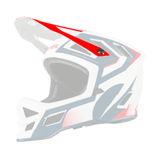 The O'NEAL Visor BLADE Hyperlite helmet OXYD is a full-face motocross helmet in white with blue and red geometric patterns and ventilation on the sides and chin guard.