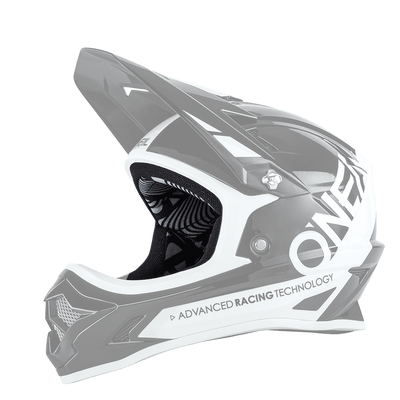 Der O'NEAL Liner & Cheek Pads BACKFLIP Helm ist ein schwarz-weißer Fullface-Motocross-Helm mit Visier, Belüftungsöffnungen und dem Aufdruck "O'NEAL" sowie "ADVANCED RACING TECHNOLOGY" an der Seite.