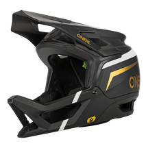 Der O'NEAL TRANSITION Helm FLASH ist ein schwarzer Fullface-Mountainbike-Helm mit weißen und goldenen Akzenten, einem großen Visier, einem auffälligen O'NEAL-Logo und einer hervorragenden Belüftung für optimalen Schutz.