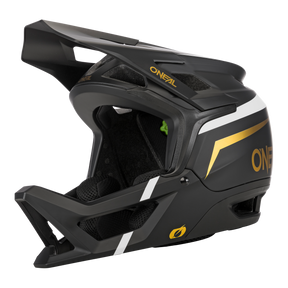 Der O'NEAL TRANSITION Helm FLASH ist ein schwarzer Fullface-Mountainbike-Helm mit weißen und goldenen Akzenten, einem großen Visier, einem auffälligen O'NEAL-Logo und einer hervorragenden Belüftung für optimalen Schutz.