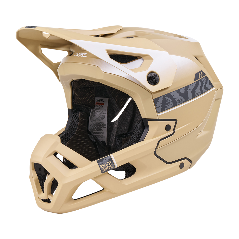 Der O'NEAL SL1 Helm TERRA ist ein sandfarbener Fullface-Mountainbike-Helm mit schwarzer Innenausstattung, Belüftungsöffnungen, Visier, dezenten Seitenstreifen und Branding - bietet optimalen Schutz als Ausrüstung für anspruchsvolles Terrain.