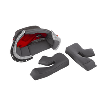 O'NEAL Liner & Cheek Pads 3SRS Helmet by O'NEAL: Removable gray padded pads with textured surface, shown next to a partially disassembled red and gray helmet liner on a white background.
