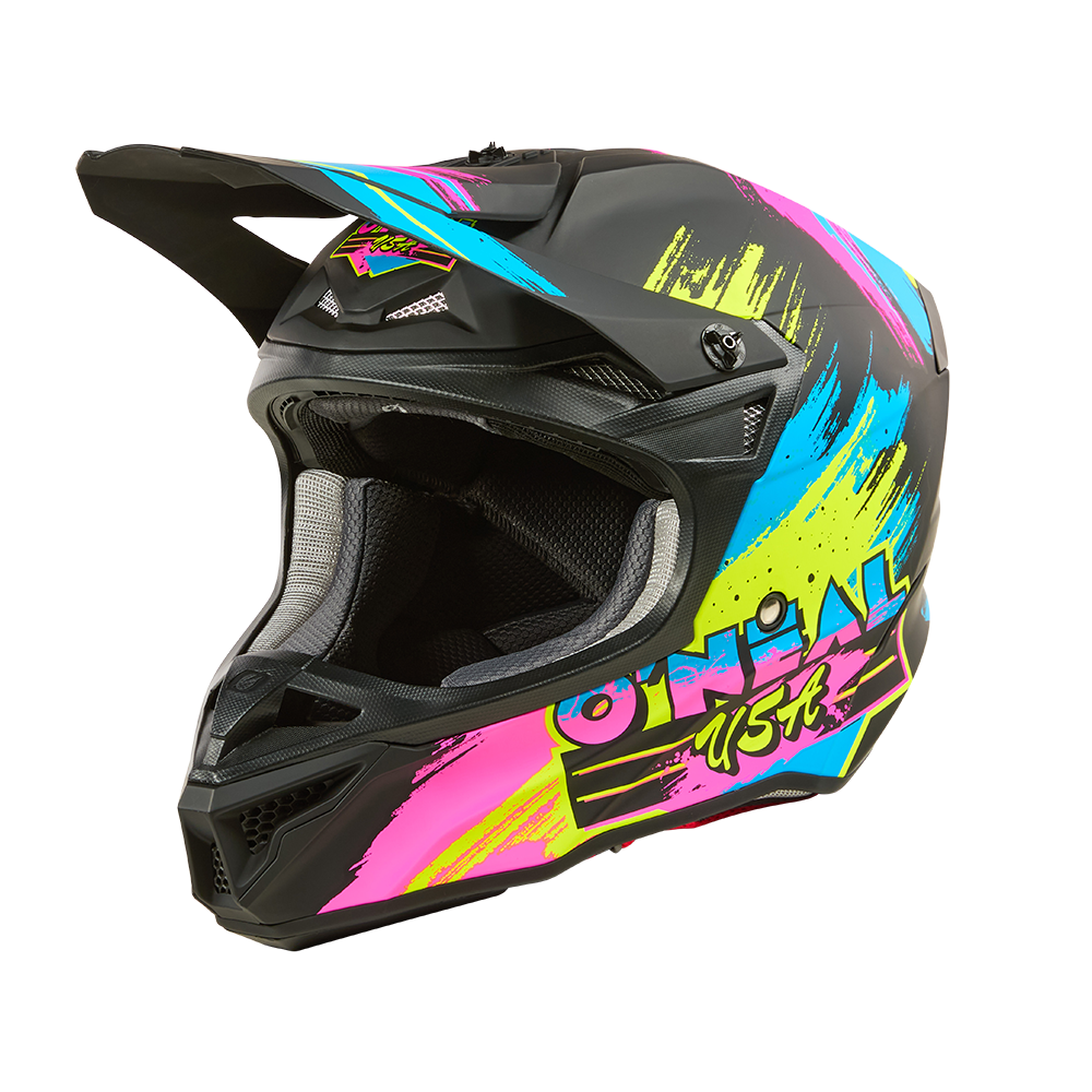 L'O'NEAL 5SRS Polyacrylite Helmet RESEDA è un casco da motocross con visiera di colore nero/neon, caratterizzato da accattivanti motivi graffiti blu, gialli e rosa e dal logo O'NEAL sul lato.