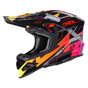 El casco O'NEAL F-SRS CRUX tiene una calota negra con modernos gráficos en naranja neón, rosa, amarillo y gris, una gran visera y las letras "O'NEAL" en naranja en el lateral.