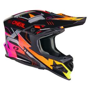 El casco O'NEAL F-SRS CRUX es un casco de motocross negro con visera, que presenta llamativos motivos geométricos en naranja, amarillo, rosa, blanco y gris, así como la inscripción "O'NEAL" en rojo en el lateral.