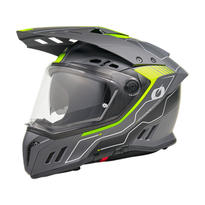 El casco Sierra RS ECHO de O'NEAL es un casco negro y gris con detalles en amarillo neón y verde, visera transparente y un diseño ventilado que se muestra de perfil sobre fondo blanco.
