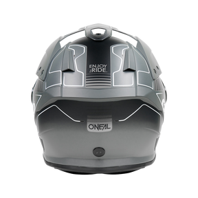 Vista trasera del casco O'NEAL Sierra RS ECHO en gris y negro con detalles de neón blanco, "ENJOY THE RIDE" en la parte superior, el logotipo de O'NEAL debajo y equipado con el sistema E.Q.R.S. para mayor seguridad.