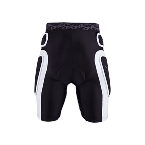 El PRO SHORT O'NEAL de O'NEAL es un culotte acolchado de color blanco y negro, con muslos y caderas reforzados y cintura elástica "ONEAL". Se muestra sobre fondo transparente.
