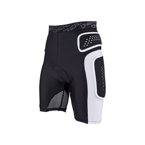 El PRO SHORT O'NEAL es un culotte negro acolchado con inserciones blancas de protección en los muslos y las caderas, inserciones de malla de ventilación y cintura elástica O'NEAL. Equipamiento de alta calidad para ciclistas. Se muestra sobre un fondo monocolor.