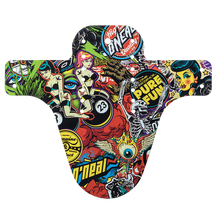 The AZONIC SPLATTER mudguard CRANK by AZONIC is a colorful bike mudguard with vibrant pop art stickers featuring cartoon women, a skeleton, skulls, a winged eyeball, bold text and eye-catching graphic designs.