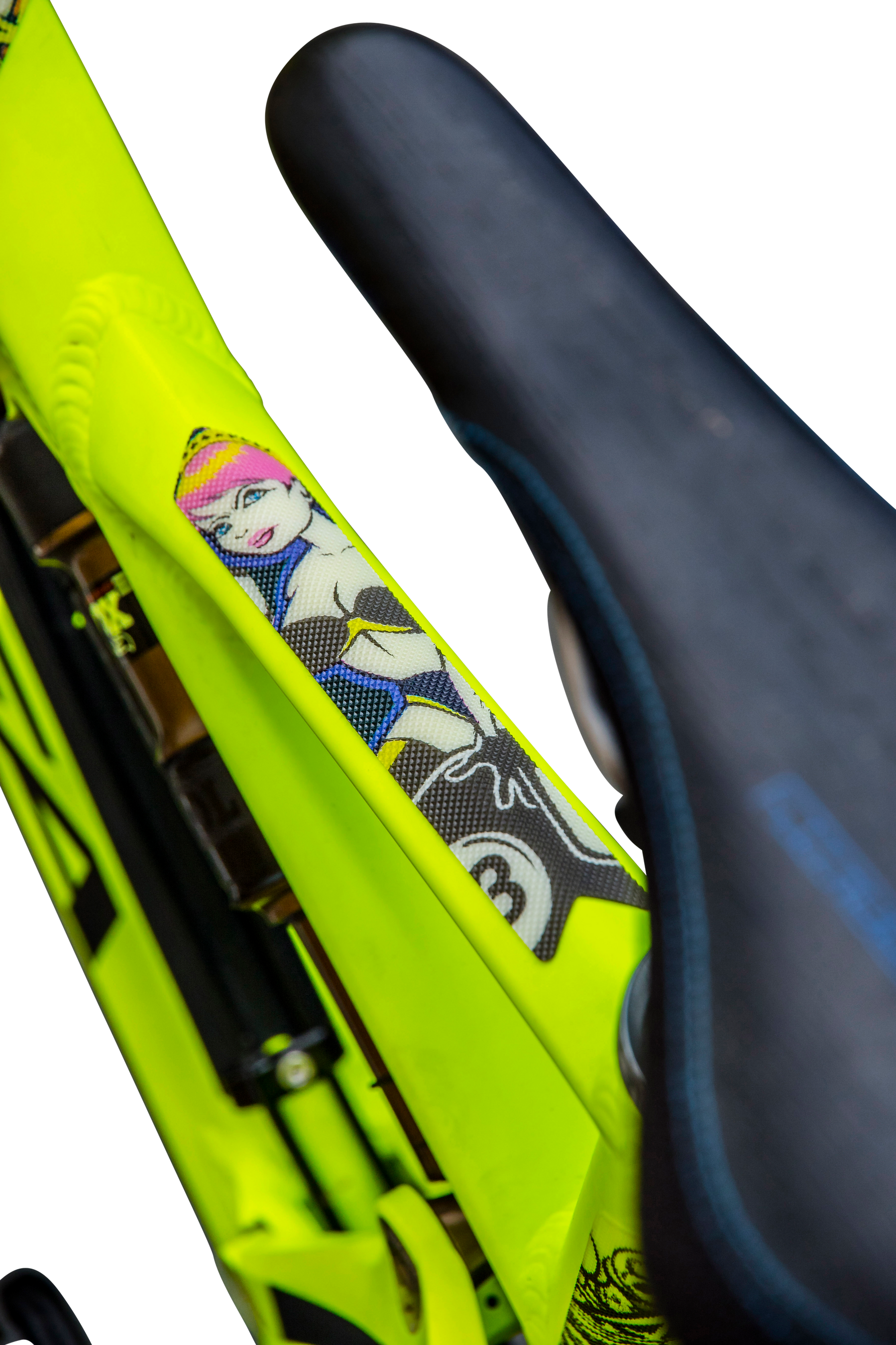 Nahaufnahme eines neongelben AZONIC-Fahrradrahmens mit schwarzem Sattel, mit AZONIC FRAME GUARDS und einer Cartoon-Grafik einer Frau mit rosa Haaren und blauem Outfit auf einem Fahrrad.