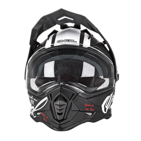 The O'NEAL SIERRA TORMENT helmet is a black and white helmet with a clear visor, ventilation openings and the red lettering "Born In The Dirt" and "Made In Hell" on the chin. Its angular design is perfect for rough motocross adventures.