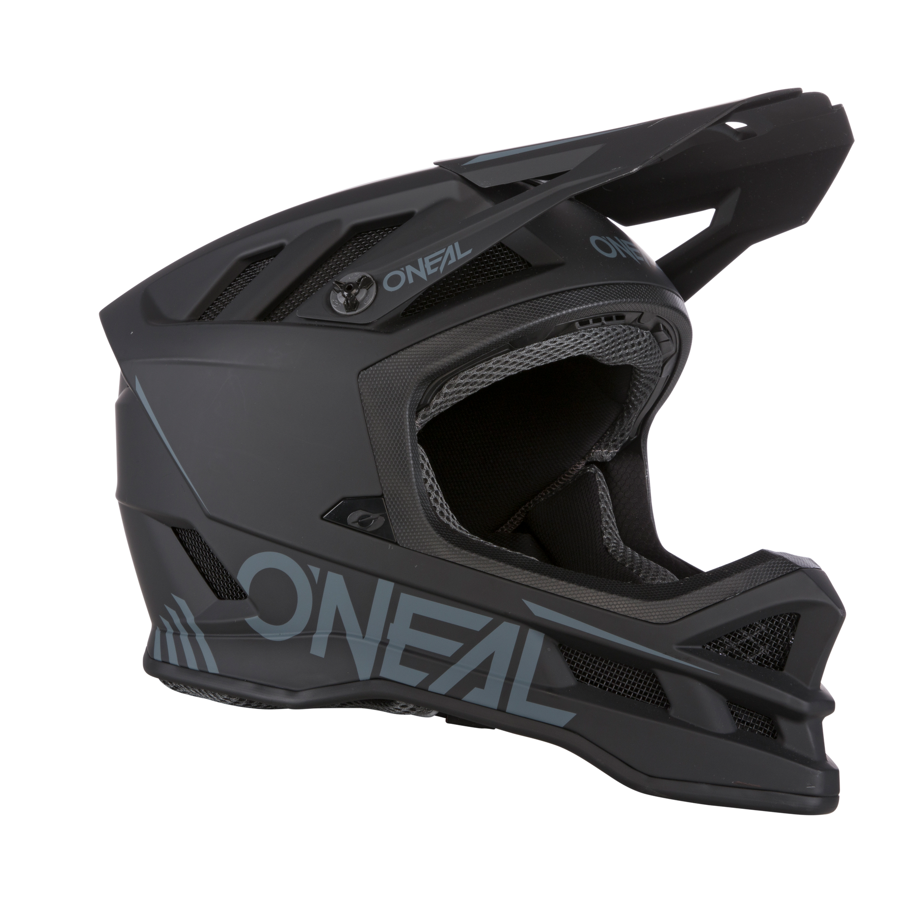 Ein mattschwarzer O'NEAL BLADE Polyacrylite Helm SOLID mit Visier und Belüftungsöffnungen, dargestellt von der Seite, zeigt das große graue O'NEAL Logo.