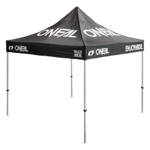 The O'NEAL RACE TENT is a black pop-up tent with white lettering "O'NEAL" and "ENJOY THE RIDE" on the roof and flounces, which stands on four metal feet.
