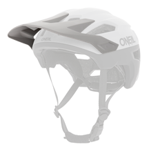 The O'NEAL Visor TRAILFINDER Helmet SPLIT in white and black features a visor, ventilation holes and an adjustable chin strap. Shown on a plain white background.
