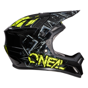 Le casque O'NEAL BACKFLIP ZOMBIE est un casque intégral noir et jaune fluo avec un design anguleux, une visière, un branding accrocheur, de grandes ouvertures d'aération et un motif géométrique - parfait pour le motocross ou le VTT.