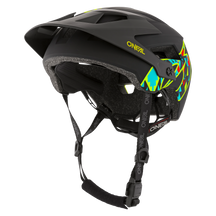 Der O'NEAL DEFENDER Helm MUERTA ist ein schwarzer Fahrradhelm mit Visier, blauen und gelben grafischen Akzenten, verstellbaren Riemen und einem gepolsterten Kinnschutz - ideal für Enduro- oder All Mountain-Fahrten. Wählen Sie O'NEAL für Top-Schutz und Stil.