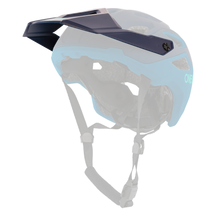 The O'NEAL Visor PIKE Helmet SOLID by O'NEAL is a blue and black mountain bike helmet with visor, ventilation holes and adjustable black straps, shown from the side against a white background.