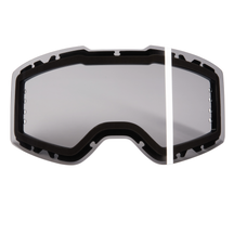 Die O'NEAL B-30 ROLL OFF SPARE LENS ist eine klare, grau getönte Goggle-Scheibe von O'NEAL mit einem einzelnen weißen vertikalen Streifen auf der rechten Seite und einer schwarzen Umrandung.