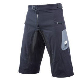 The O'NEAL ELEMENT FR Shorts HYBRID are black, knee-length cycling shorts with a front zipper, snap button closure, zippered side pockets and a gray, reflective patch on the left thigh - perfect for outdoor cycling.