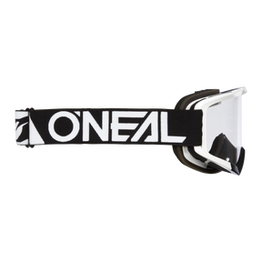 Seitenansicht der schwarz-weißen O'NEAL VAULT Brille SOLID von O'NEAL mit klarer Scheibe und dickem Band mit auffälligem weißem Logo - die ideale Motorsportausrüstung für Schutz und Stil auf der Rennstrecke.