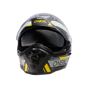 Il casco O'NEAL D-SRS SQUARE è un casco off-road nero e grigio con accenti gialli, una visiera oscurata e la scritta "O'NEAL" sulla parte frontale e sui lati, che spicca su uno sfondo nero.