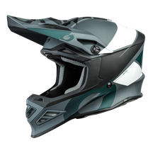 The O'NEAL F-SRS GLITCH helmet has a matte gray, black and white finish with a large visor, an edgy design and ventilation openings for optimal protection, shown here in profile view.