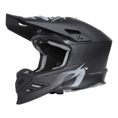 Il casco O'NEAL F-SRS Solid, un casco integrale da motocross nero opaco con visiera e grafica bianca, presenta caratteristiche di sicurezza come il paradenti ventilato, il design squadrato e la mentoniera per una protezione ottimale della testa.