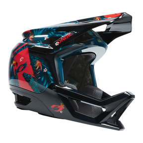 Il casco O'NEAL Transition TwiceMe RIO è caratterizzato da uno scudo integrale, una visiera e una mentoniera in nero con accattivanti motivi floreali tropicali rossi e blu, raffigurati di profilo su uno sfondo a tinta unita.