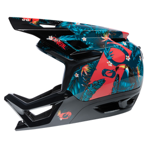 Il casco O'NEAL Transition TwiceMe RIO offre la massima protezione con un design integrale di colore nero/teal, una grafica tropicale accattivante - fenicotteri, tucani, foglie di palma e fiori bianchi - e una visiera integrata per garantire stile e sicurezza.