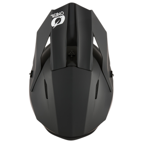Der mattschwarze Motocross-Vollvisierhelm O'NEAL 1SRS Helm SOLID ist von oben abgebildet und zeichnet sich durch kantige Designlinien und ein weißes O'NEAL-Logo in der Nähe der oberen Front aus.