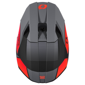 Vue de dessus du casque O'NEAL 3SRS VISION en gris/noir mat avec des accents rouges, "O'NEAL" sur le côté et "ENJOY RIDE" sur le dos. Avec des ouvertures d'aération fines et un design de casque de motocross moderne et aérodynamique.