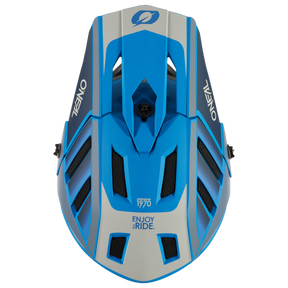 Top view of the O'NEAL BACKFLIP helmet ECLIPSE in blue, gray and white with ventilation slots, O'NEAL logo and "ENJOY THE RIDE" and "1970" on the front - ideal for your next mountain bike adventure.