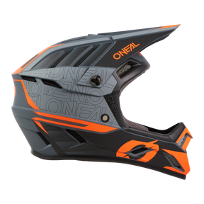 The O'NEAL BACKFLIP helmet ECLIPSE is a matte black full-face MTB helmet with bold orange accents and geometric patterns, with "O'NEAL" lettering on the side and visor, ventilation slits and a sturdy chin guard for optimum protection.