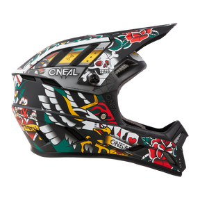 The O'NEAL BACKFLIP helmet INKED is a full-face MTB helmet with eye-catching, tattoo-inspired graphics - roses, skulls, maps and wings on black. The striking "O'NEAL" logo stands out and makes it ideal for motocross or mountain bike riding.