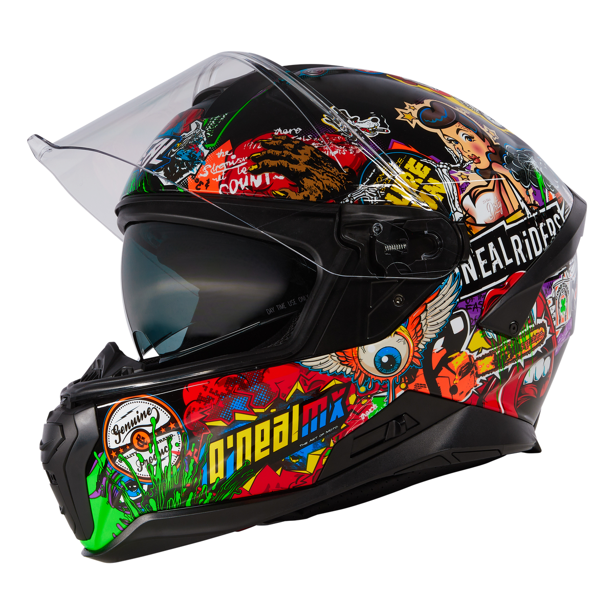 Der O'NEAL CHALLENGER Helm CRANK ist ein farbenfroher Integralhelm mit klarem Visier und auffälligen Grafiken im Graffiti-Stil, darunter eine Cartoon-Frau, Totenköpfe, Augen und ein auffälliges O'NEAL-Branding an der Seite.