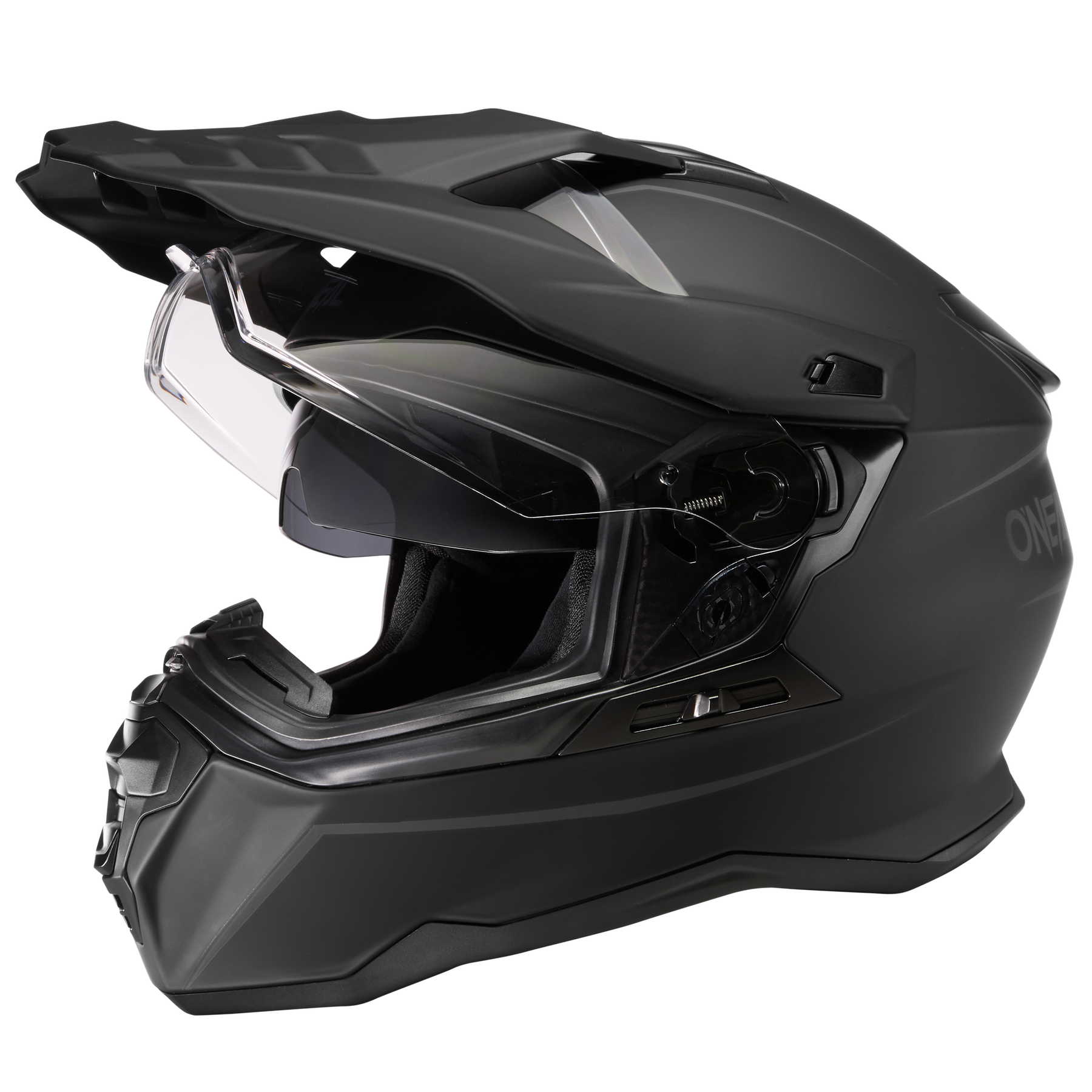 Der O'NEAL D-SRS Helm SOLID ist ein mattschwarzer Integralhelm mit klarem Visier, kantigem Design und verlängertem Kinnschutz, dargestellt in der Seitenansicht.