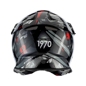 Il casco da motocross O'NEAL F-SRS SYNTHY nero presenta disegni geometrici rossi e argento, prese d'aria e la scritta in grassetto "Racing Since 1970" sul retro, abbinata a testi e grafiche più piccoli per garantire stile e protezione della testa.