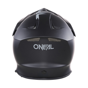 Vista posteriore del casco O'NEAL F-SRS nero Solid Quin ready con aperture di ventilazione e logo bianco. Questo casco elegante combina il comfort con funzioni di sicurezza avanzate per la tua guida.
