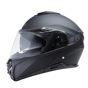 The O'NEAL M-SRS helmet SOLID by O'NEAL is a matte black full-face helmet with a clear visor, aerodynamic shape and side ventilation as well as visible mechanical details.