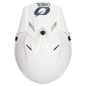 Top view of a white O'NEAL VOLT helmet SOLID with angular ventilation slots, a central black fastener and the black O'NEAL logo on the top.