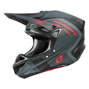 Le casque O'NEAL 5SRS Polyacrylite SPIKE est un casque de motocross à visière intégrale noir mat et gris avec des accents rouges, des motifs géométriques, une visière marquante, des points d'aération et une construction robuste en polyacrylite.